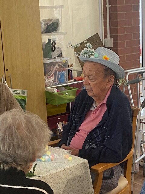 Resident modelling their homemade Easter bonnet 2 rotated