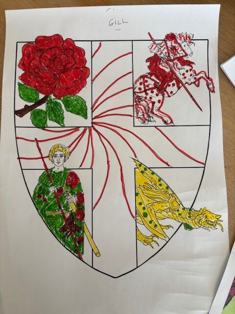 Finished shield coloured in with felt tip pen rotated