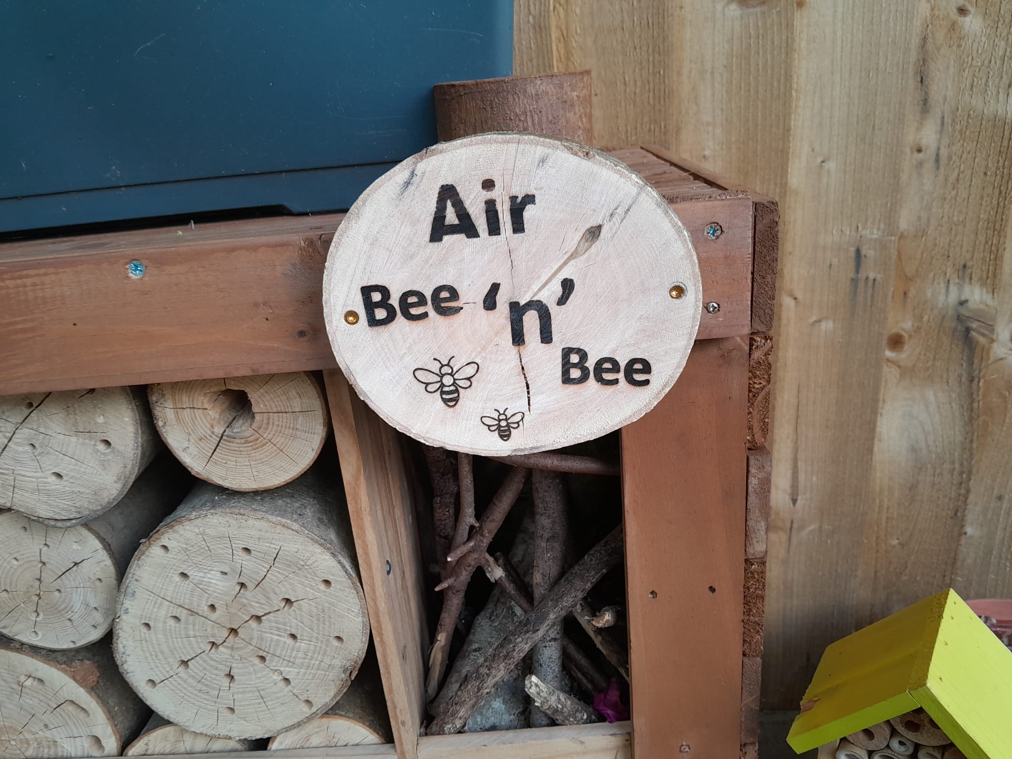 Air Bee n Bee sign on homemade habitat hotel